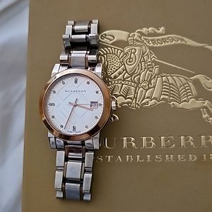 Burberry watch is silver and rose gold